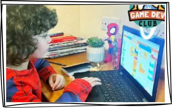 Child enjoying an online coding session